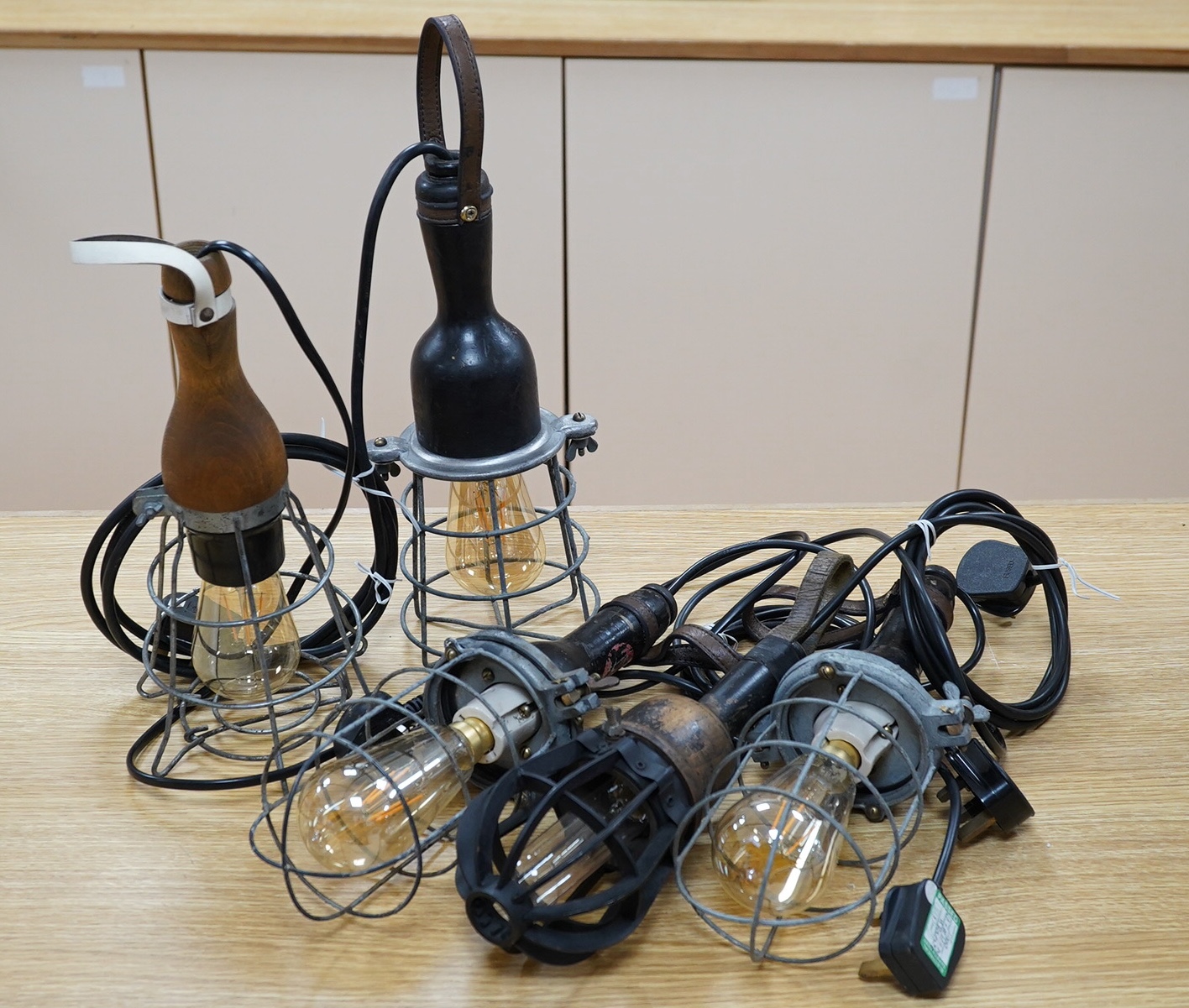 A pair and three other industrial hanging lights. Condition - worn. Not tested as working